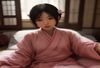 肉文屋2026年夏季版本更新发布会现场，团队成员围坐在会议桌旁讨论新功能规划，投影屏幕上展示着更新路线图